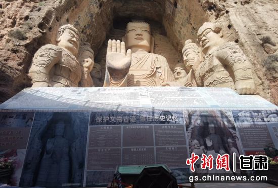 時下，中國“石窟鼻祖”天梯山石窟第13窟大佛足部與局部危巖體搶救性保護項目正在施工。圖為施工現場。陳曉斌 攝