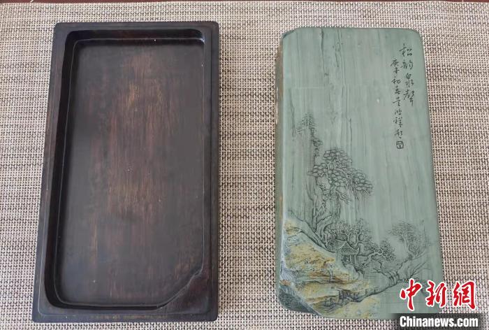 圖為盧保勝為提升洮硯文化內(nèi)涵，制作“一硯一銘、一盒一拓”成品展示?！堟?攝