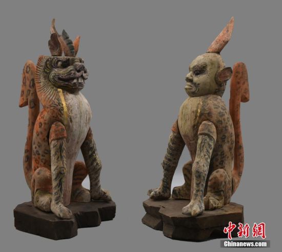 圖為慕容智墓出土鎮(zhèn)墓獸。 中新社發(fā) 甘肅省文物局 供圖